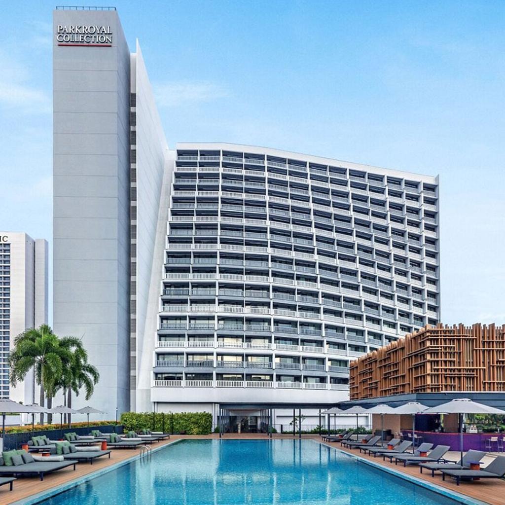 Pan Pacific Singapore outdoor pool with city skyline at night