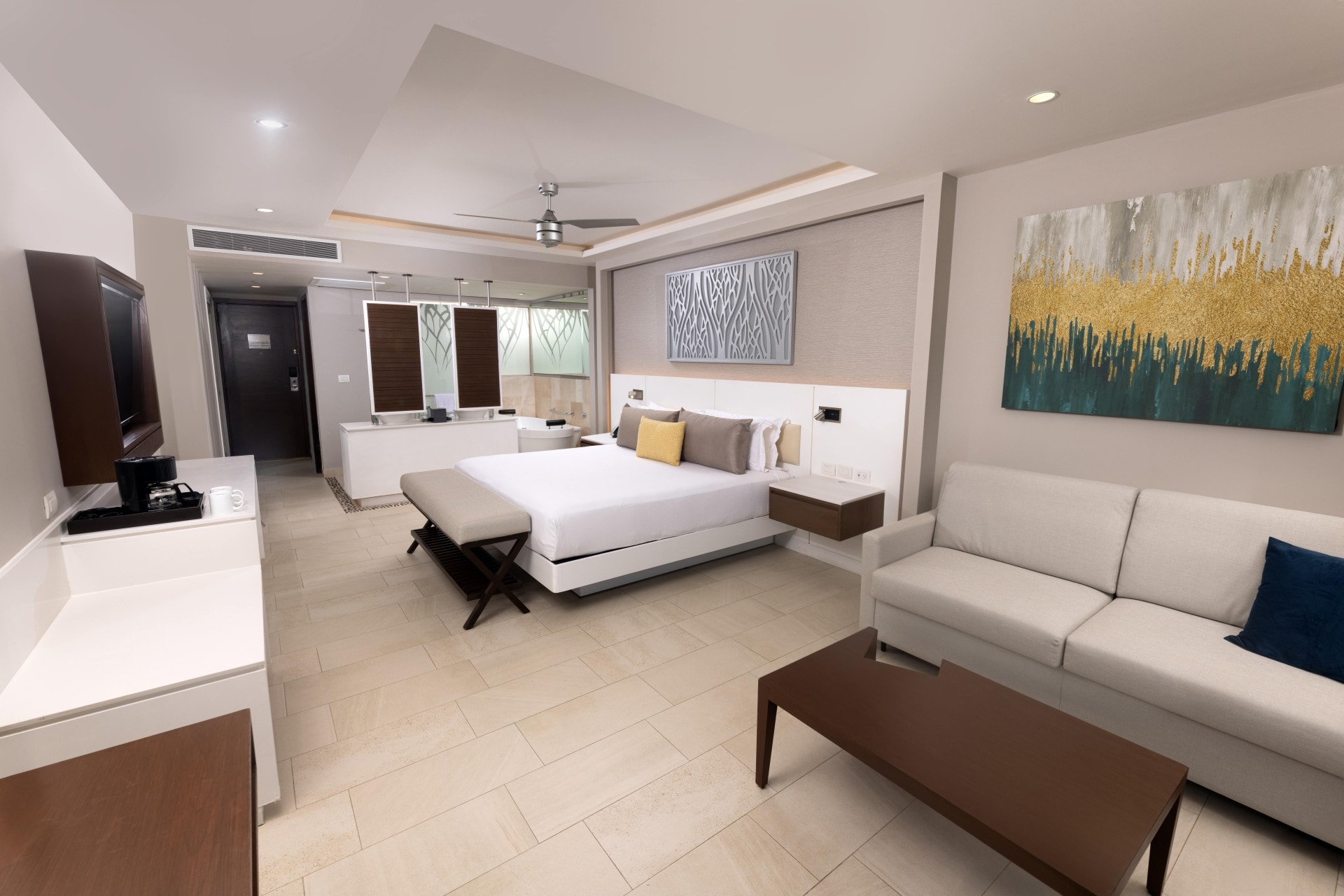 Luxury Junior Suite interior at Royalton Hideaway with king bed and living area